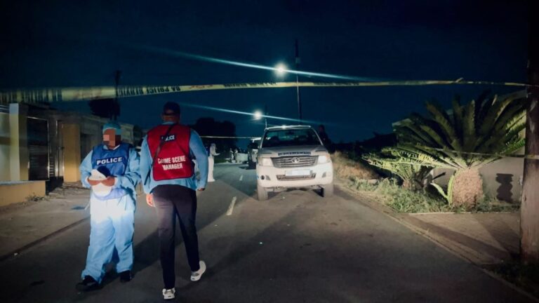 Police vehicles and flashing blue lights at the scene of a deadly early morning shootout in KwaMashu, KwaZulu-Natal