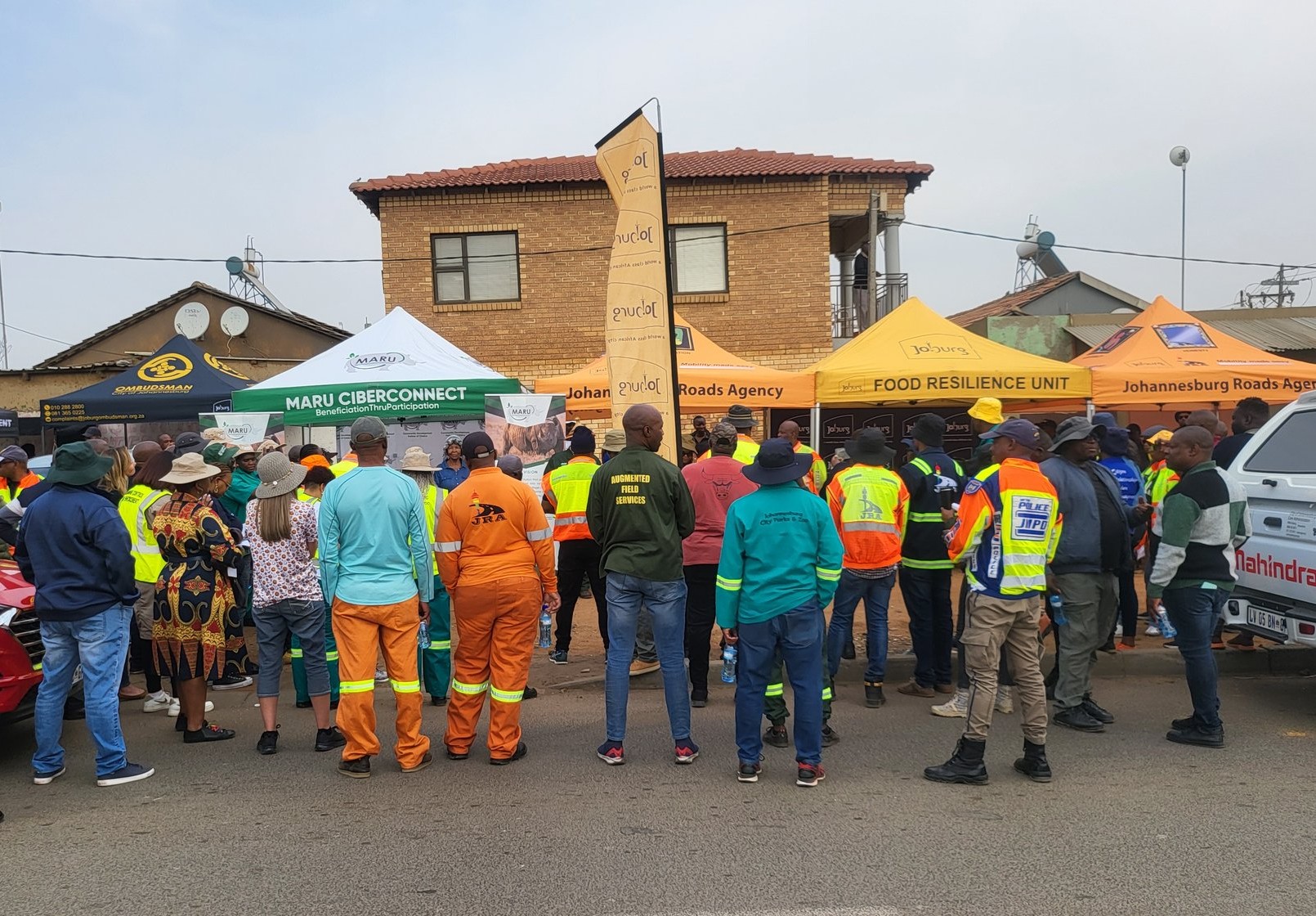 City of Johannesburg MMC Jack Sekwaila with officials overseeing pothole repairs and streetlight maintenance in Ivory Park.