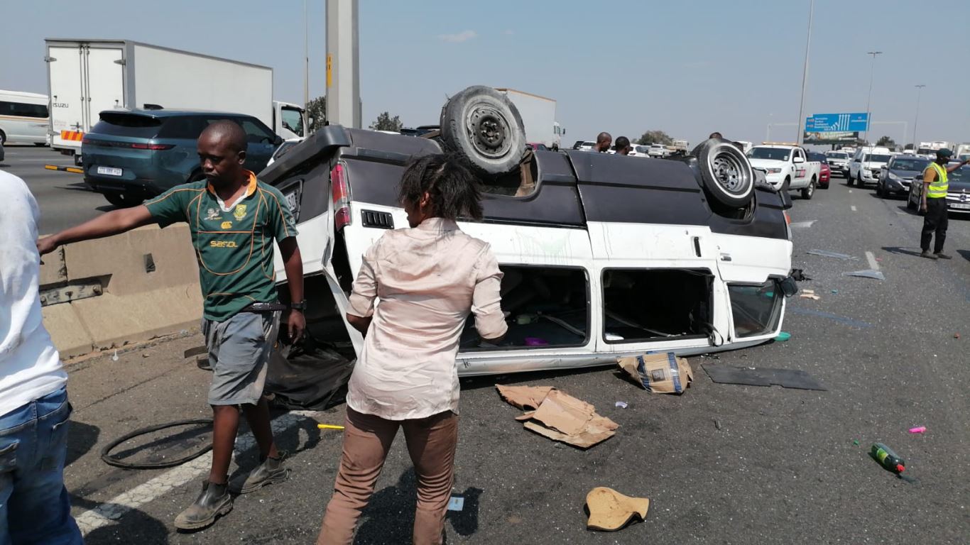 Emergency services attending to a minibus taxi overturned on the N1 North near Buccleuch interchange.